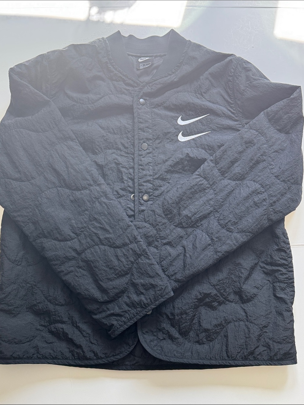 Nike Black Quilted Snap-Front Bomber Jacket with White Swoosh